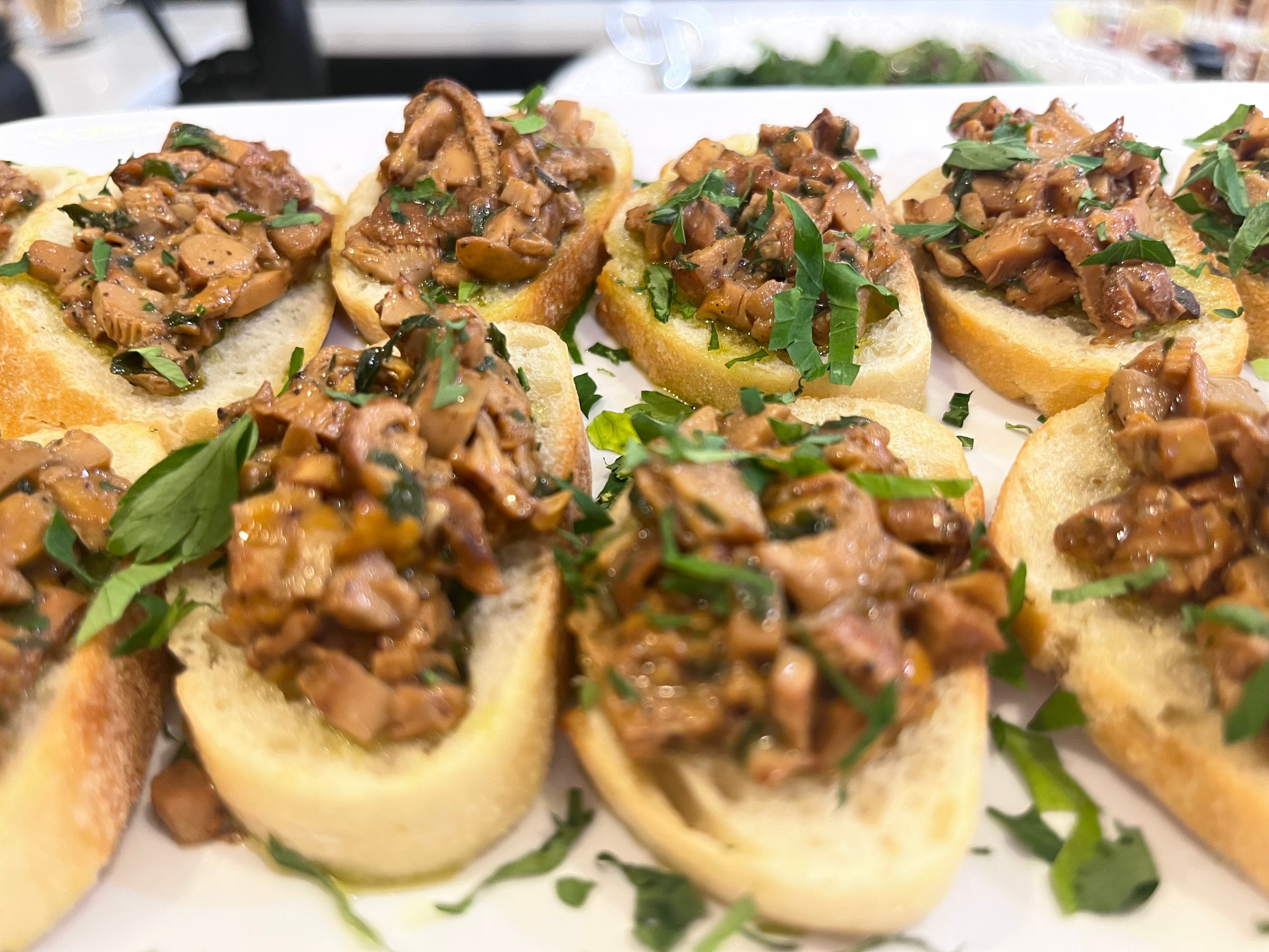 Sautéed mushroom crostini with fresh parsley