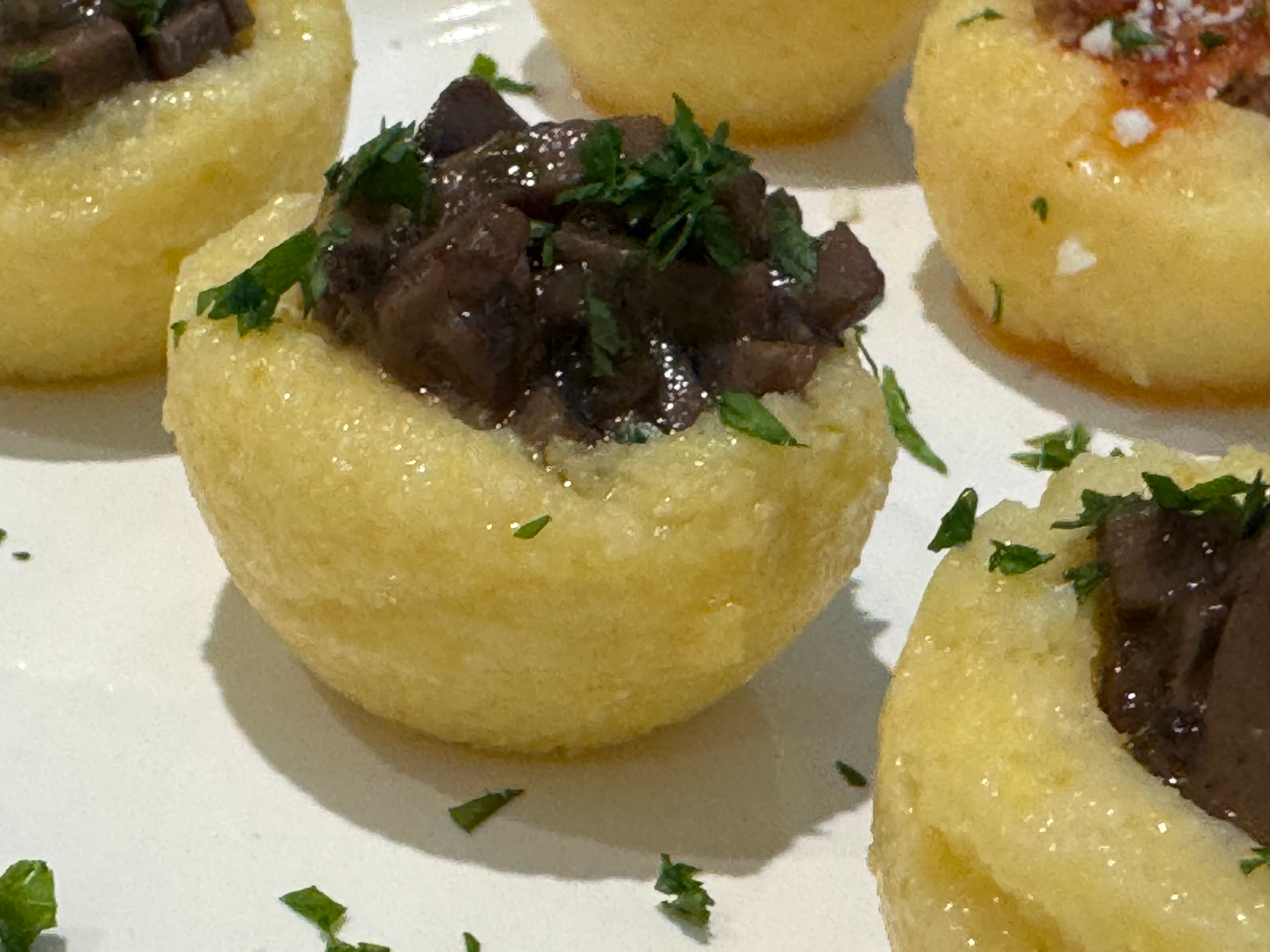 Potato halves stuffed with braised beef